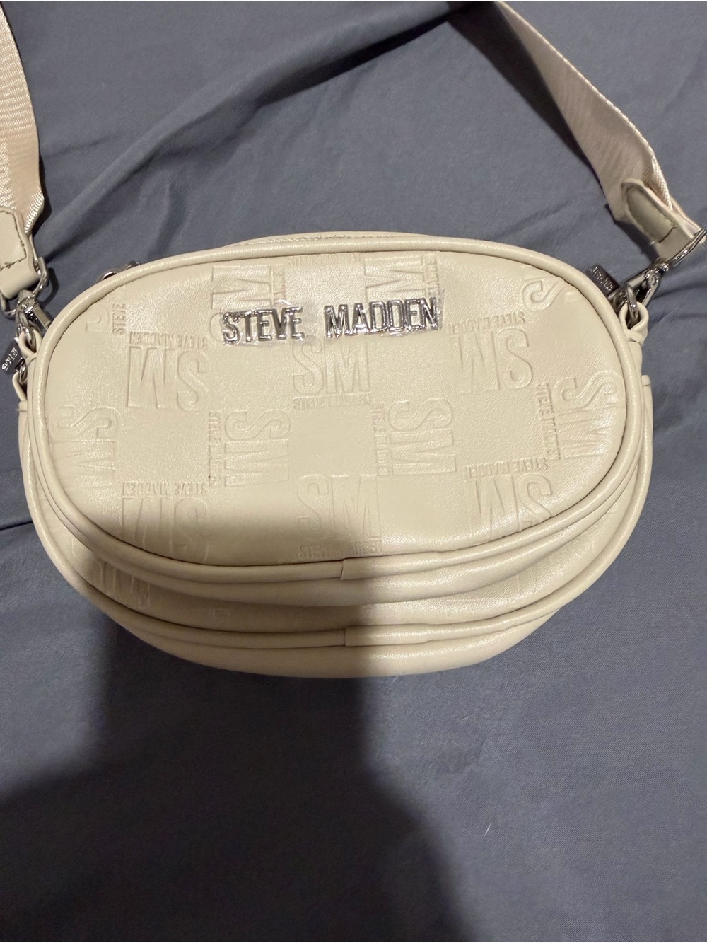 Steve Madden Off-White Quilted Logo Oval Crossbody Bag